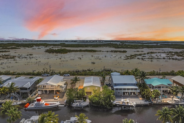 437 Pirates Rd, Little Torch, FL 33042 - aerial view at dusk of a water view and a residential view