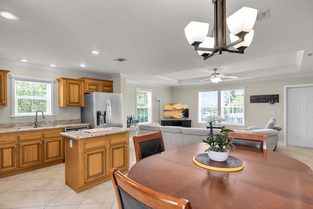 437 Pirates Rd, Little Torch, FL 33042 - kitchen featuring a sink, stainless steel appliances, plenty of natural light, a kitchen island, and ornamental molding