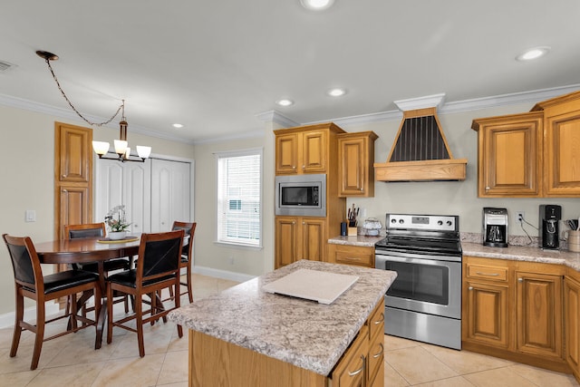 437 Pirates Rd, Little Torch, FL 33042 - kitchen featuring appliances with stainless steel finishes, a chandelier, light tile patterned floors, a center island, and ornamental molding