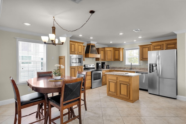 437 Pirates Rd, Little Torch, FL 33042 - kitchen featuring stainless steel appliances, custom exhaust hood, a sink, crown molding, and a center island