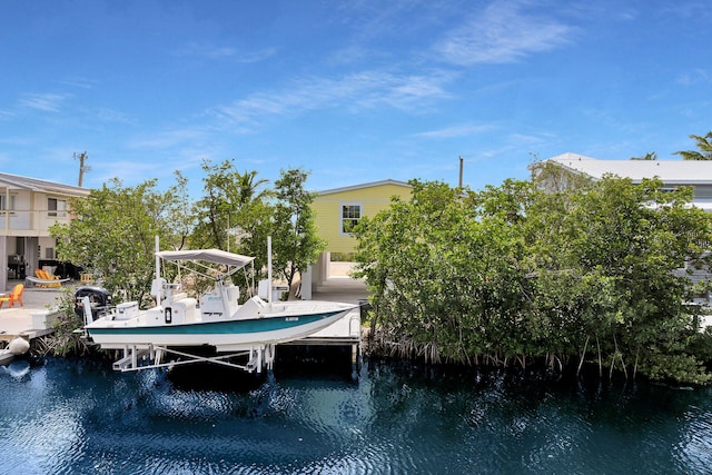 437 Pirates Rd, Little Torch, FL 33042 - dock area with boat lift and a water view