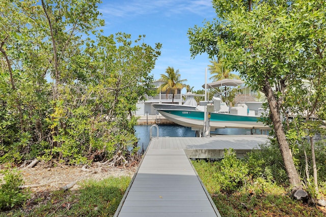 437 Pirates Rd, Little Torch, FL 33042 - dock with boat lift and a water view
