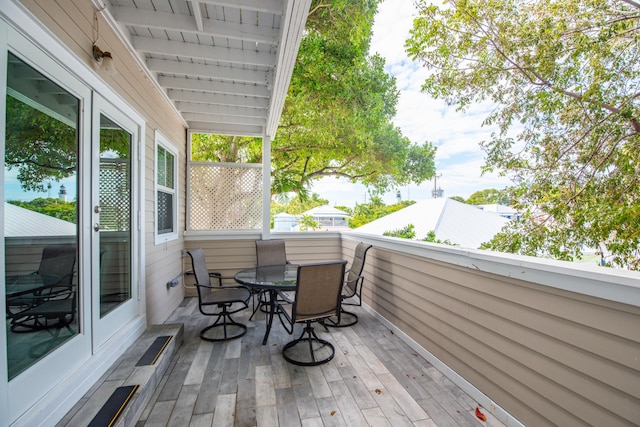 balcony featuring outdoor dining space
