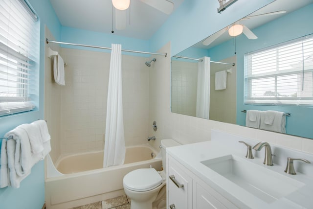 full bath with a ceiling fan, shower / tub combo, plenty of natural light, and toilet