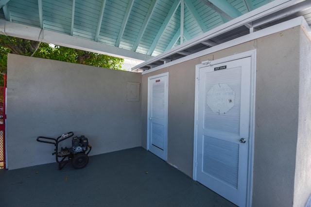 property entrance with stucco siding