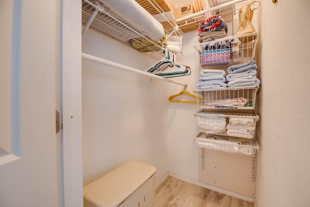 22878 Privateer Dr, Cudjoe, FL 33042 - walk in closet featuring wood finished floors