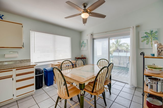 22878 Privateer Dr, Cudjoe, FL 33042 - dining space featuring light tile patterned floors and ceiling fan