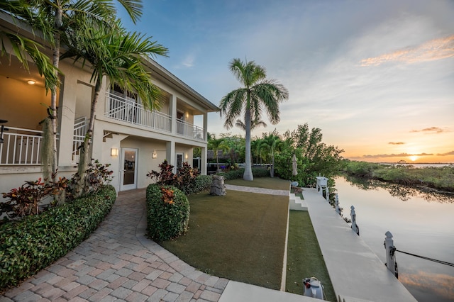 aerial view featuring a residential view and a water view