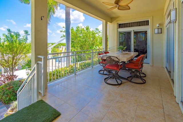 balcony featuring a ceiling fan