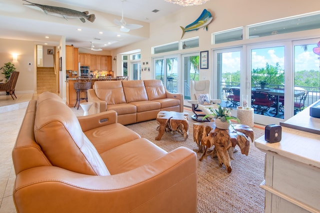 living room with light tile patterned floors, stairway, recessed lighting, and a ceiling fan