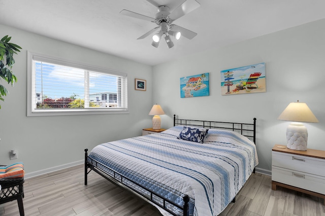 389 Anglers Dr Unit 105, Marathon, FL 33050 - bedroom featuring wood finished floors and ceiling fan