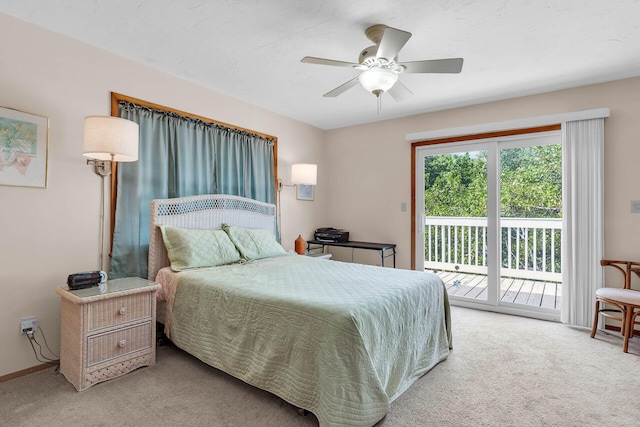 bedroom featuring carpet flooring, baseboards, a ceiling fan, and access to outside