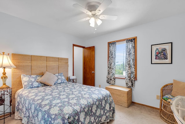 bedroom featuring baseboards, carpet, and a ceiling fan