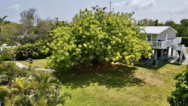 19749 Date Palm Dr, Sugarloaf, FL 33042 - view of yard with a wooden deck