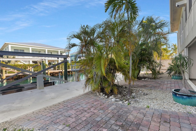 view of patio with a dock