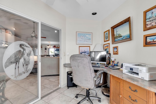 office area featuring light tile patterned floors and a ceiling fan