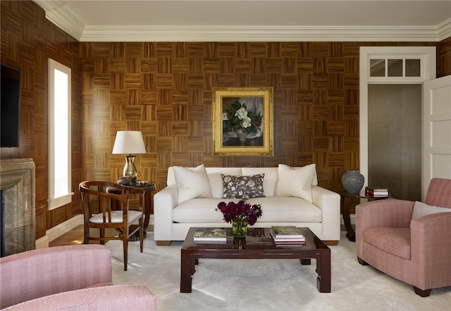 living room featuring ornamental molding and wooden walls