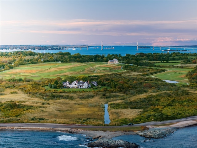 aerial view at dusk with a water view