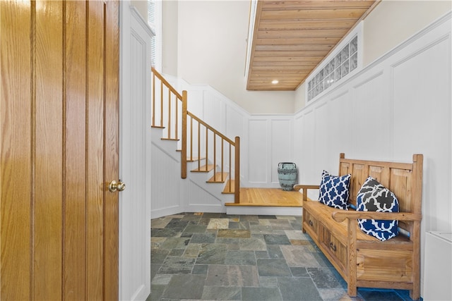 foyer featuring wood ceiling