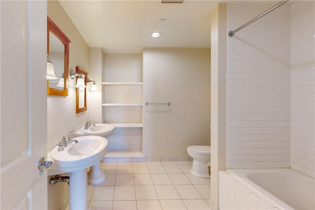 bathroom with tile patterned flooring and toilet