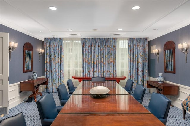 dining room featuring ornamental molding