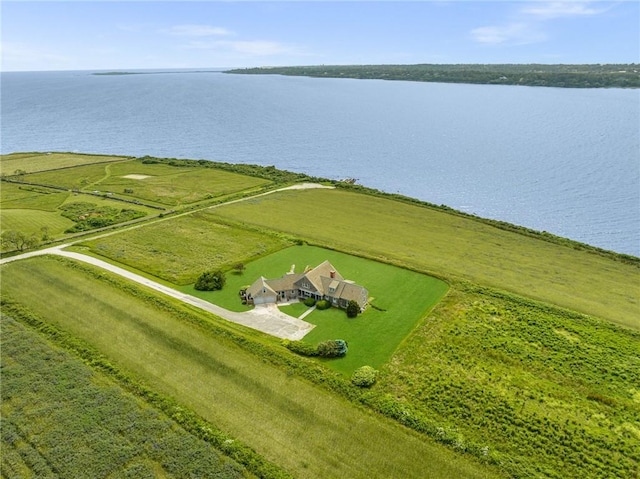 aerial view featuring a rural view and a water view