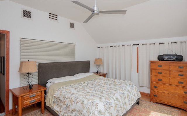 bedroom featuring ceiling fan and vaulted ceiling