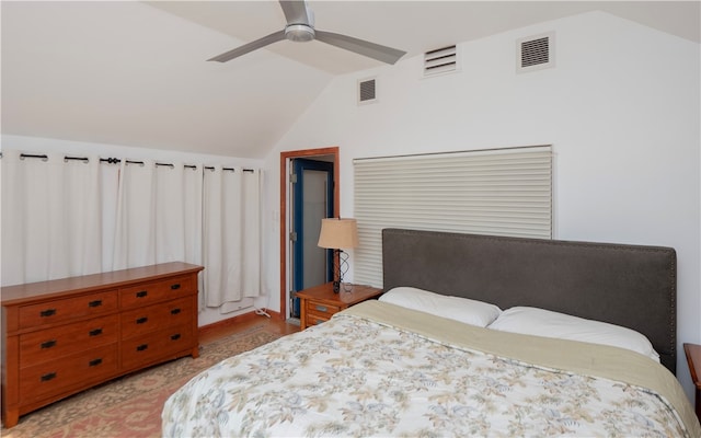 bedroom featuring ceiling fan and lofted ceiling