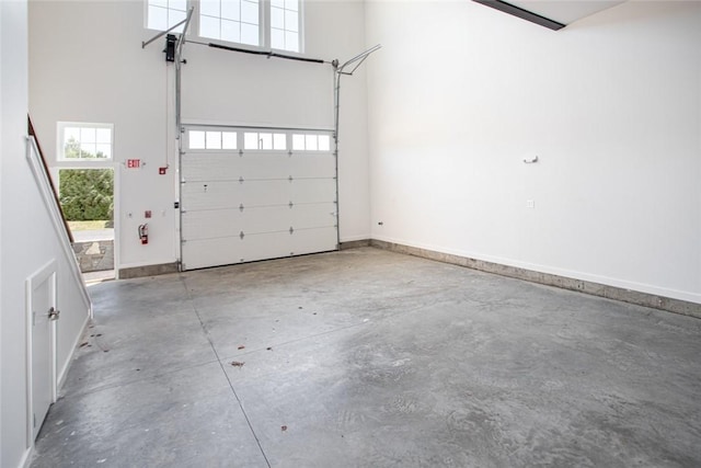 55 John Clarke Rd Unit 3, Middletown, RI 02842 - garage featuring baseboards