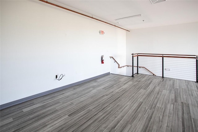 55 John Clarke Rd Unit 3, Middletown, RI 02842 - spare room with wood finished floors and baseboards