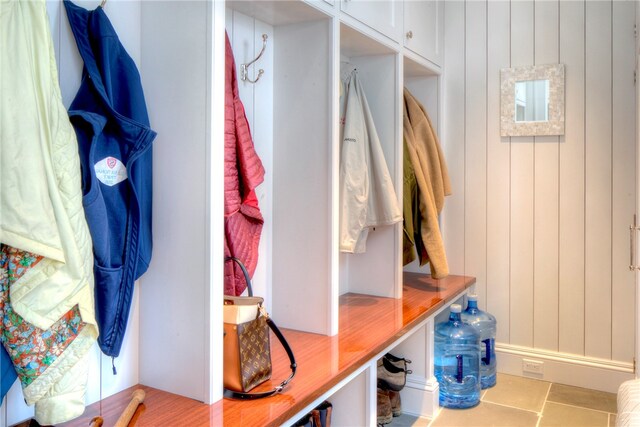 mudroom with tile flooring