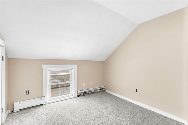 additional living space featuring vaulted ceiling, a baseboard radiator, carpet flooring, and baseboards