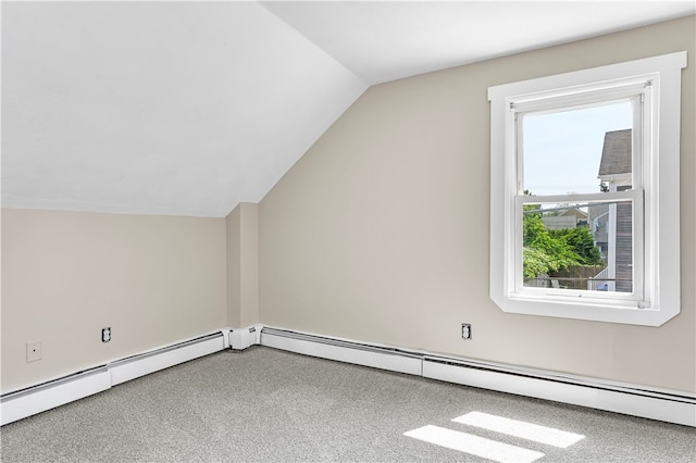 additional living space featuring vaulted ceiling, a baseboard radiator, and carpet floors