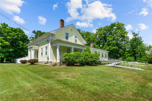 view of property exterior featuring a lawn