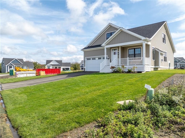 view of front of house featuring a front lawn and a porch