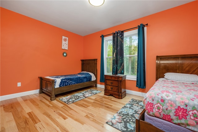 bedroom featuring hardwood / wood-style flooring