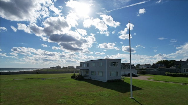 view of home's exterior featuring a lawn