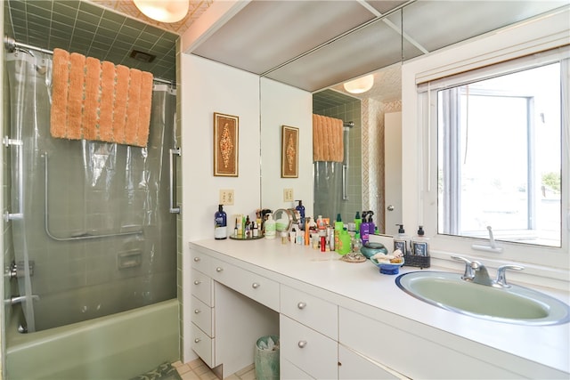 bathroom featuring shower / tub combo with curtain, vanity, and tile patterned floors