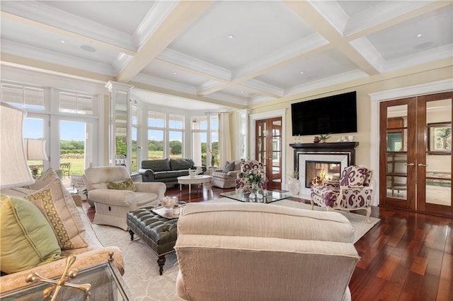 living room featuring beam ceiling, wood-type flooring, coffered ceiling, and a multi sided fireplace