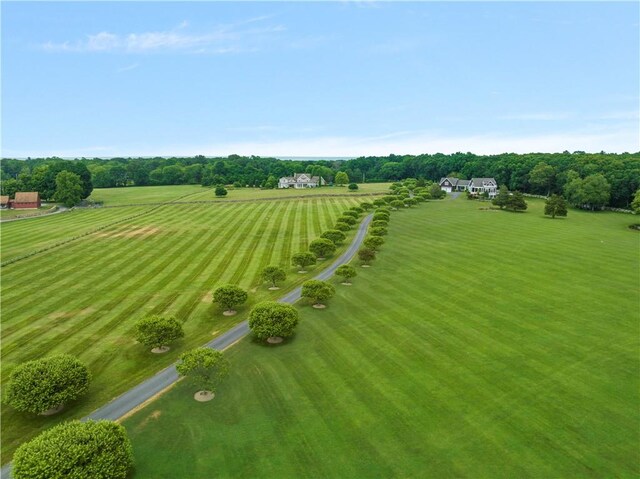 birds eye view of property featuring a rural view