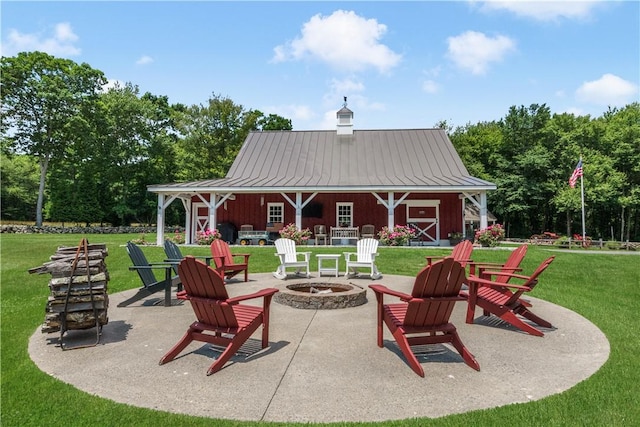 view of patio with a fire pit