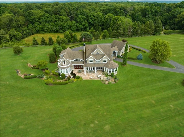 bird's eye view featuring a forest view