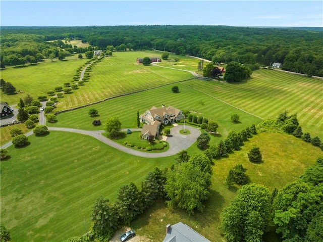 birds eye view of property with a rural view