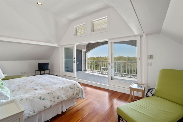 bedroom featuring lofted ceiling, access to outside, and dark hardwood / wood-style floors