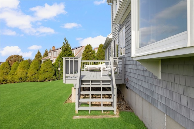 view of yard featuring a wooden deck