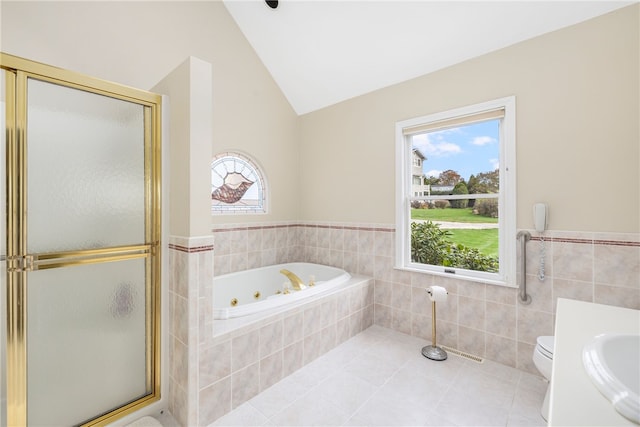 bathroom with a wealth of natural light, toilet, and independent shower and bath