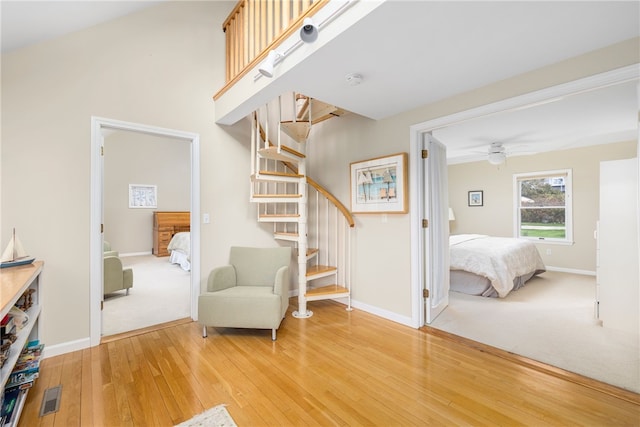 interior space featuring hardwood / wood-style floors and ceiling fan