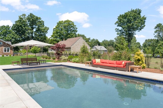 view of pool with a patio and an outdoor hangout area