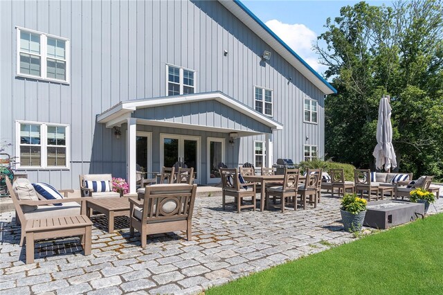 view of patio / terrace with a grill and outdoor lounge area