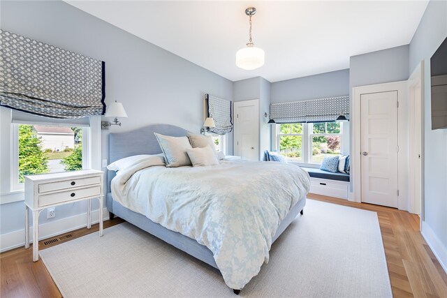 bedroom featuring hardwood / wood-style flooring